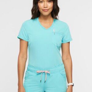 New without Tag.  Women's 2-Pocket Tuck-In Scrub Top Color: Aqua Sky Size: M